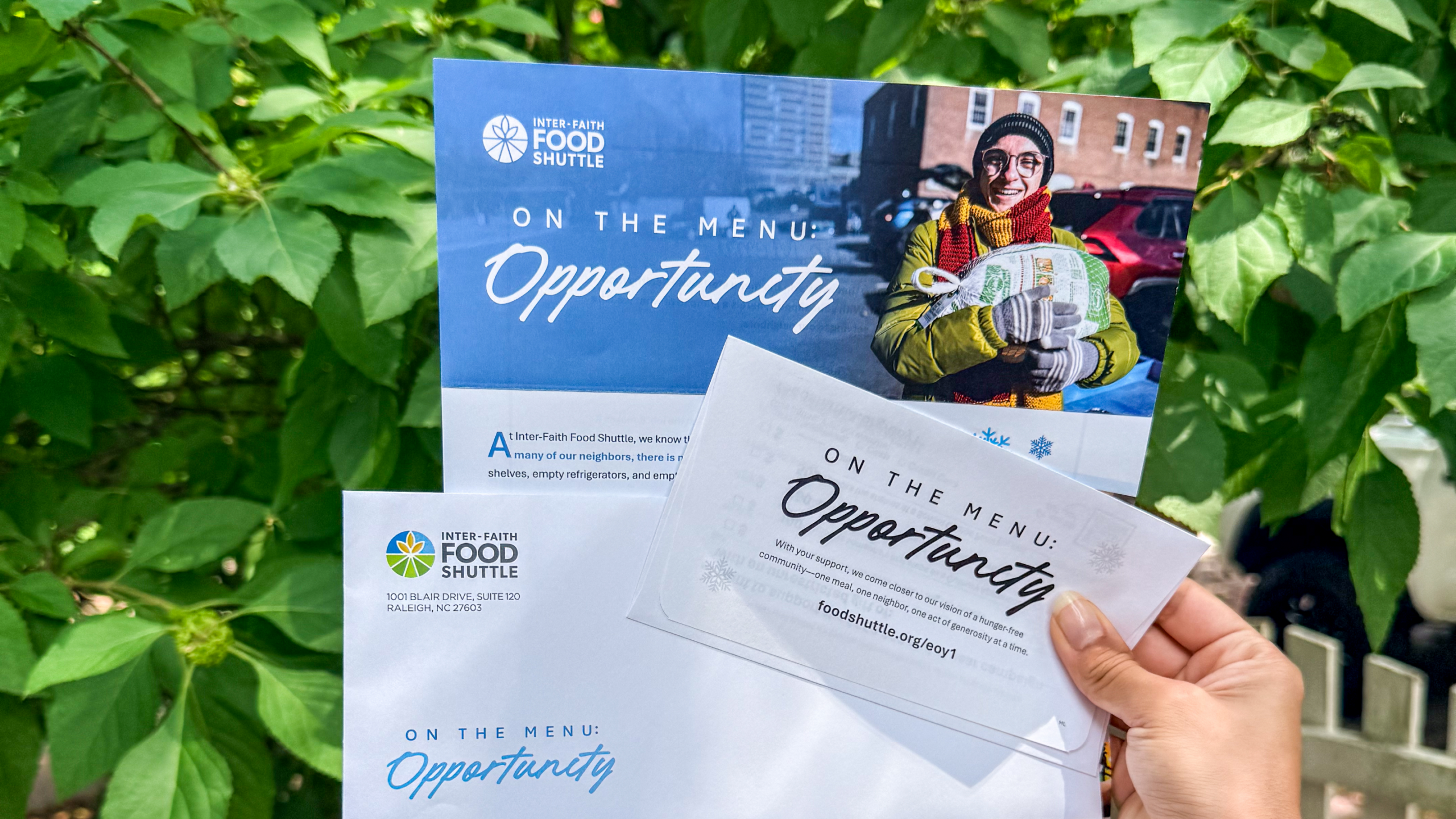 Inter-Faith Food Shuttle year-end fundraising campaign featuring a direct mail package with matching envelope, reply envelope, and appeal letter titled "On the Menu: Opportunity."